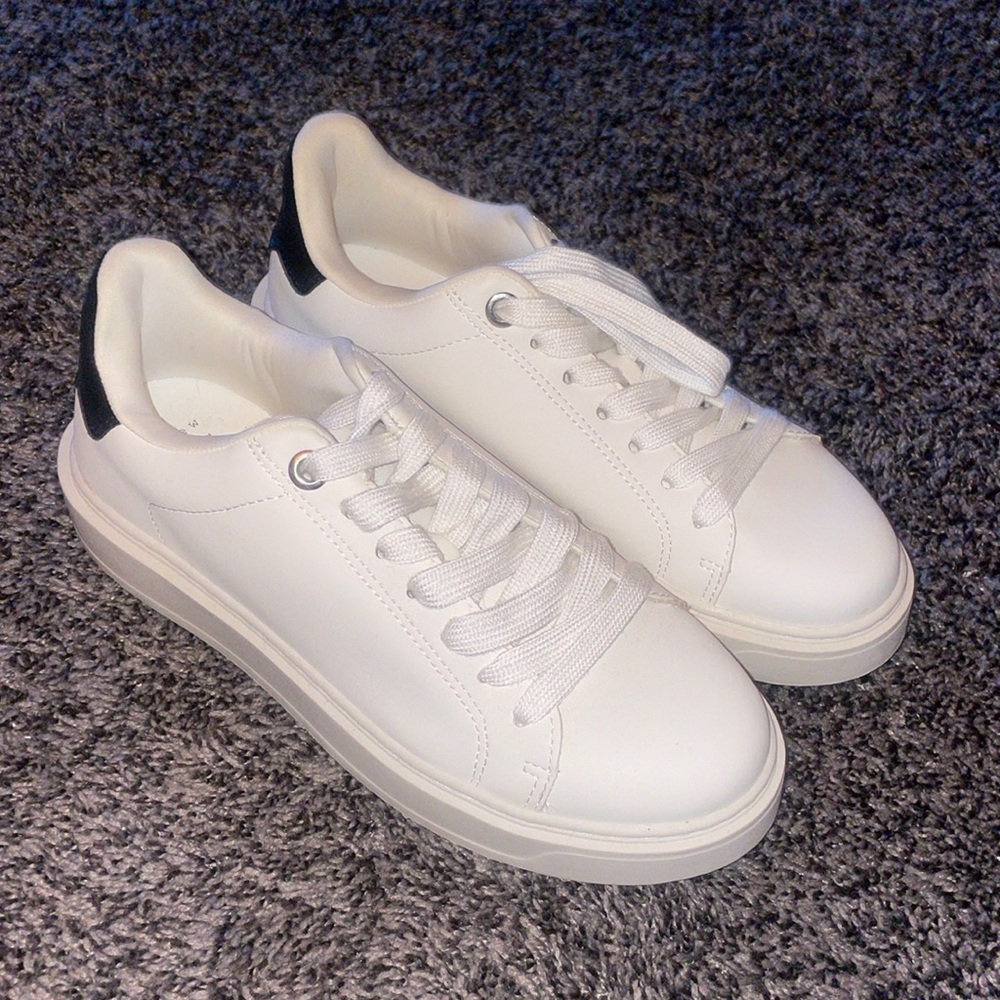 “A New Day” white sneakers